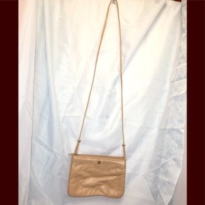 Etienne Aigner’s faux leather crossbody in beige